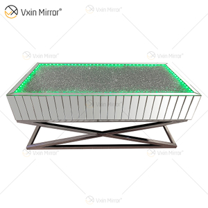 Venta caliente WXF-582 Muebles de diamante triturado de plata con soporte de acero inoxidable con altavoz y mesa de centro LED de diente azul